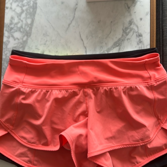 Lululemon Coral Salmon Speed Up Shorts Size 8. - Picture 11 of 13